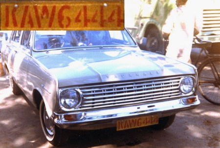 KAW 6444  --  red-on-yellow Karachi Trade-plate on a new British Vauxhall Victor, there in 1965.     Brumby archive.