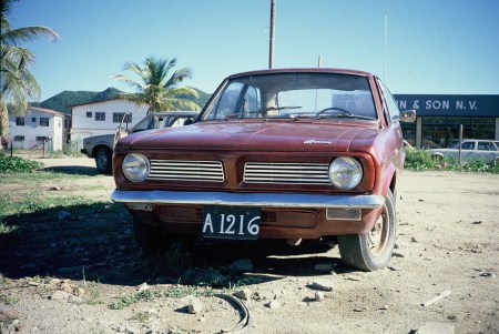 a typical painted woden plates on a Morris Marina, the worst British car ever made.