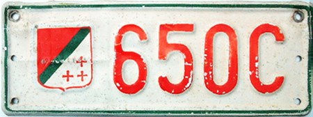 A Fiat 600 appeared in Kensington circa 1963, carrying Katanga plates and a properly-manufactured KAT oval. It re-registered before long, and the kindly owner gave me one plate, 650 C, which of course, I still have.