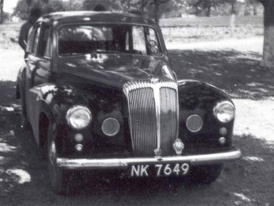 NK 6749 is carried by a Daimler Conquest Century, an unusual car for Africa, one surmises. These used preselector gearboxes - and lots of interior walnut trim! NK=one of the codes for Kitwe.