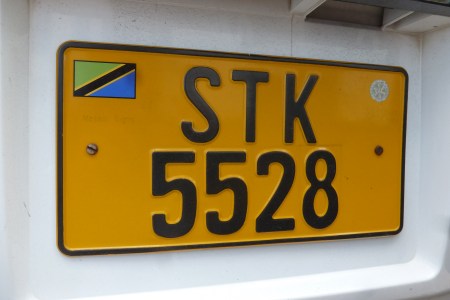 The more common government vehicle plate uses the ST prefix, which ran to 9999 and then took a letter suffix between the ST code and the serial number, as with STK 5528. K appears to be the latest suffix reached.
