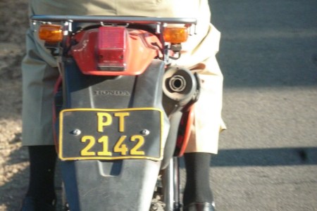 Properly-pressed motor-bike version for police, using an unusual font.
