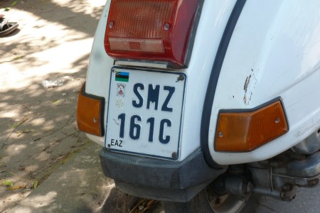 Current government issues have developed to three numerals and a serial letters, presumably because the previous system reached 9999. There are hundreds of Vespas in Zanzibar - far more than there are light motorcycles, which woud have thought were much more suitable for the poor roads...... SMZ 151 C here/