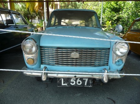 Another Austin, an A40 model, retired to an outdoor museum in Kota Kinabual, Sabah, but sporting 1960s plates from Labuan Island.