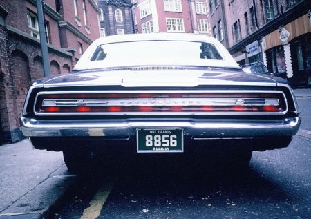 Before each island issued its own plates, they used mainland numeric issues,  often with 'OUT ISLANDS' on the home-made plate, and often on a green background with white lettering.     This is a 1960s picture taken outside Harrods in London during the early 1960s.        Brumby archive c.1962