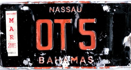 This obsolete Dealer plate from the 1976-97 colour series, was for sale in a fleamarket in Nassau.    Brumby archive 2015