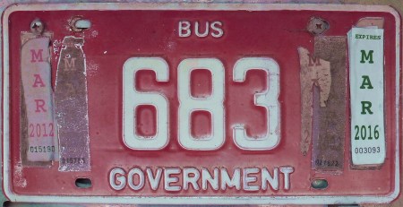 Bahamas buses come in several plate types.   Here is a Government bus, which might be seen on any island, without any differentiation.      683 is seen in Geat Exuma.             Brumby archive 2015.