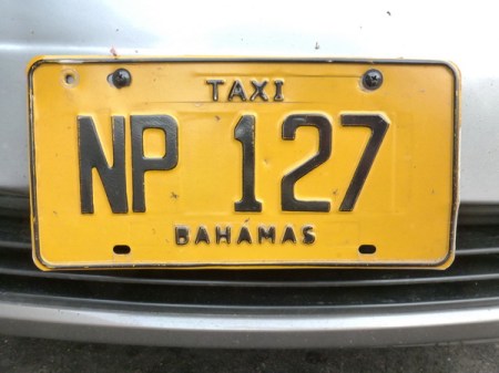 NP 127  --  Nassau, capital of the Bahamas, uses the code of its island, New Providence, to code its taxi plates.    Brumby archive 2015