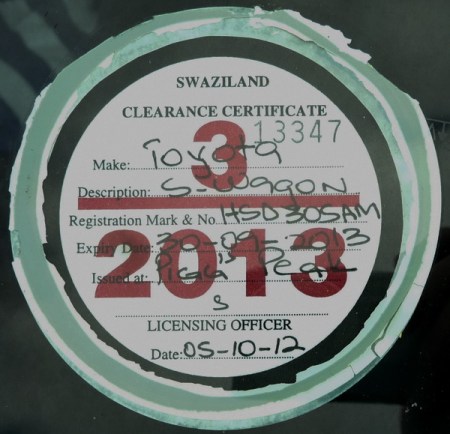 Windscreen-mounted tax discs are used in Swaziland by those who can afford them.     Brumby archive