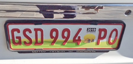 Seen in Cape Town in June 2015, a new series of Swaziland Government plates, emulating the South African red digits for state vehicles.  Swazi plates have always been made for them bu South Africa.   SG is Swazi govt. and PO is for the Police.